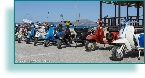 Vespa club scooters.