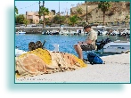 Artist in Grek harbour.